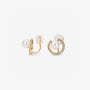 Front and side profile of pearl crescent moon clip on earrings on a clean white background.
