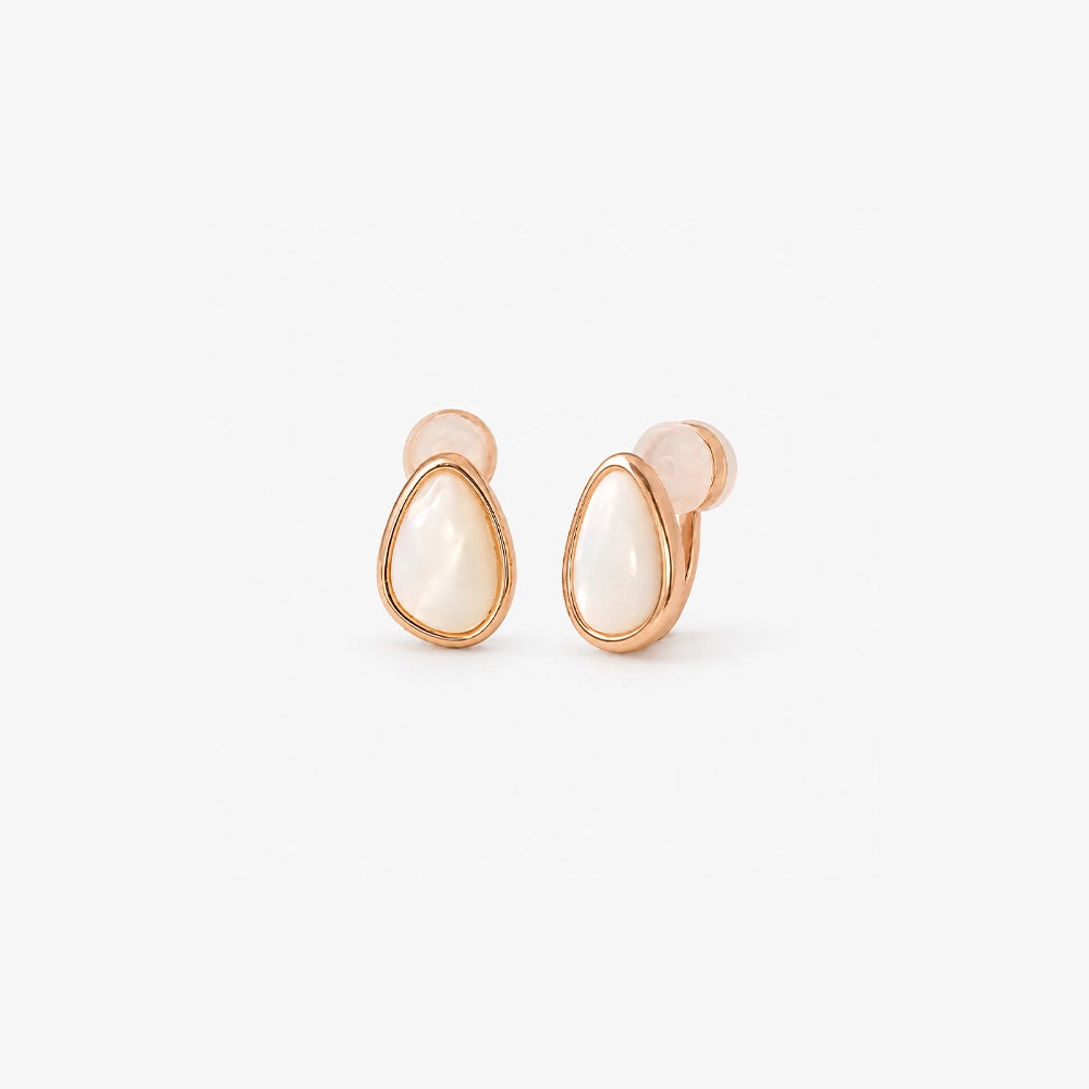 Front view of a pair of teardrop mother of pearl cabochon earrings in a warm rose gold bezel setting, shown on a clean white background.
