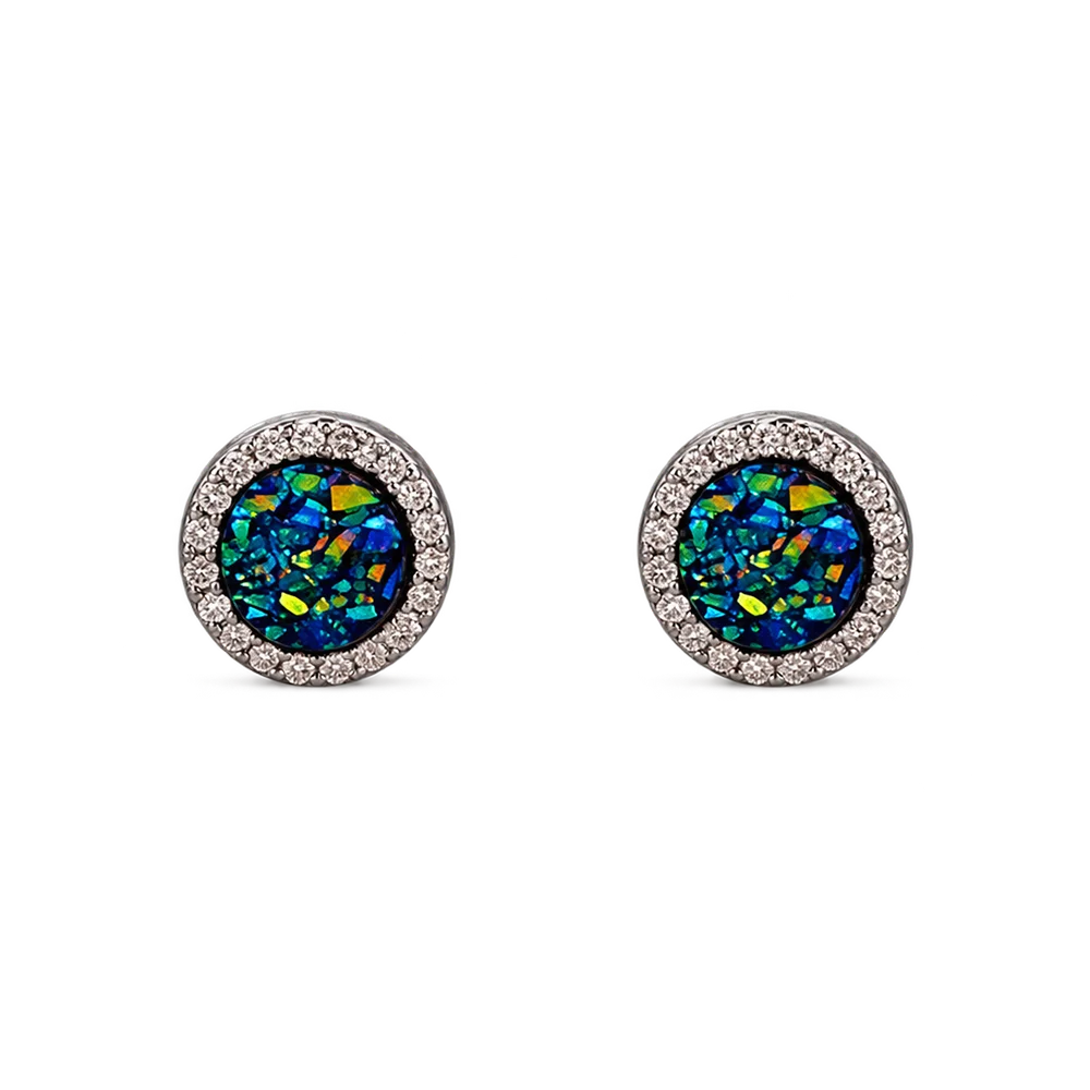 A pair of round stud earrings featuring iridescent blue and green opal-like center stones surrounded by a halo of small clear stones in a silver-toned setting, shown on a plain white background.
