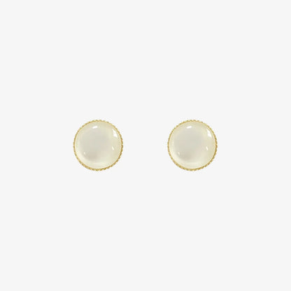 A pair of no-piercing Frosted Moonstone invisible clip-on stud earrings, with their luminous white stones, isolated on a white background.