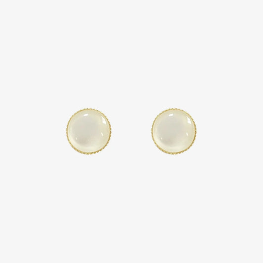 A pair of no-piercing Frosted Moonstone invisible clip-on stud earrings, with their luminous white stones, isolated on a white background.
