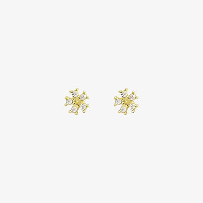A pair of no-piercing Golden Snowflake Crystal invisible clip-on earrings, with their radiant gold-tone and clear cubic zirconia, isolated on a white background.