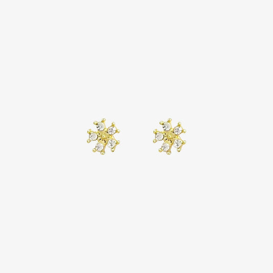 A pair of no-piercing Golden Snowflake Crystal invisible clip-on earrings, with their radiant gold-tone and clear cubic zirconia, isolated on a white background.