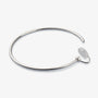 Single large silver-tone hoop clip-on earring showing the U-Type clip and resin pad