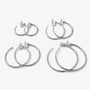 Four pairs of silver-tone hoop clip-on earrings arranged by size for comparison