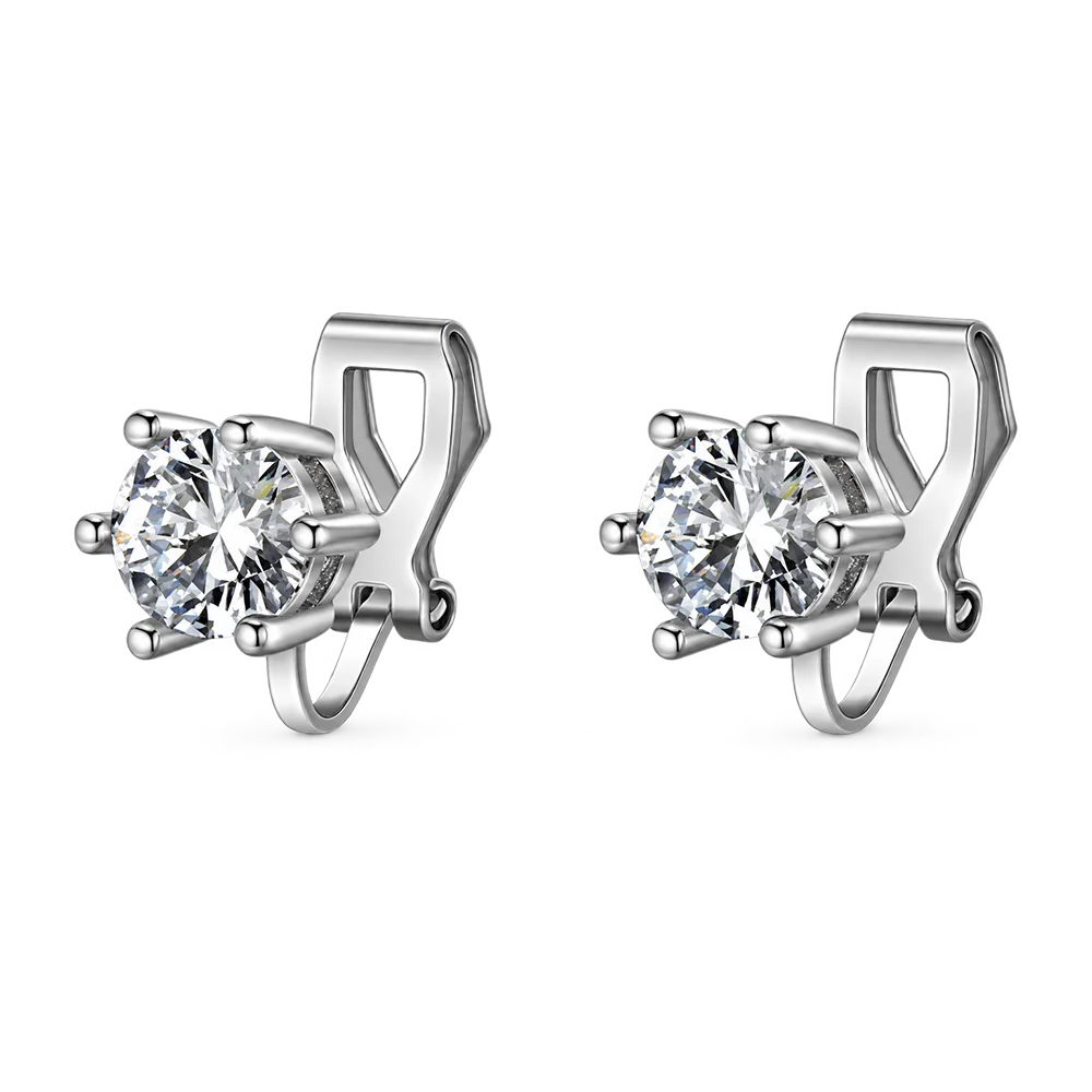 A pair of silver solitaire clip-on stud earrings featuring round-cut cubic zirconia in a six-prong setting, shown on a white background.