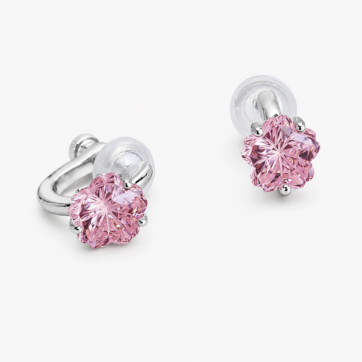 Pink cherry blossom clip-on studs showing the silver-tone screw-back clip from the side