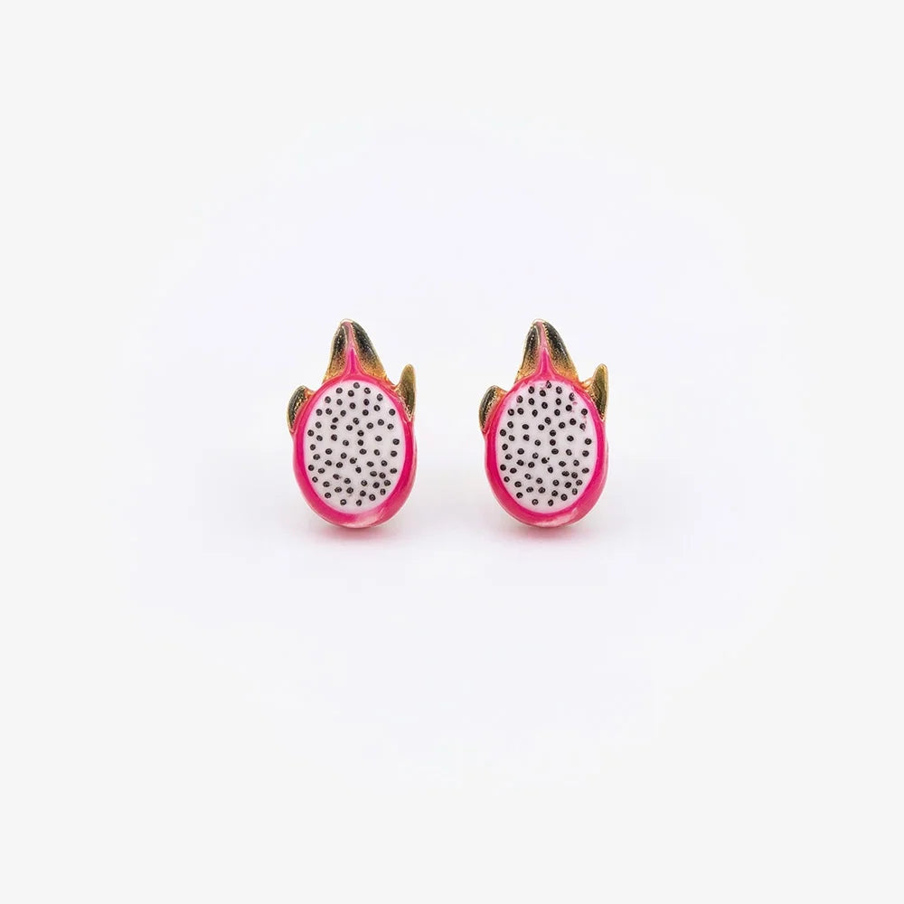 Front view of a pair of pink enamel pitaya dragon fruit magnetic clip-on stud earrings showing detailed white flesh and black seeds.