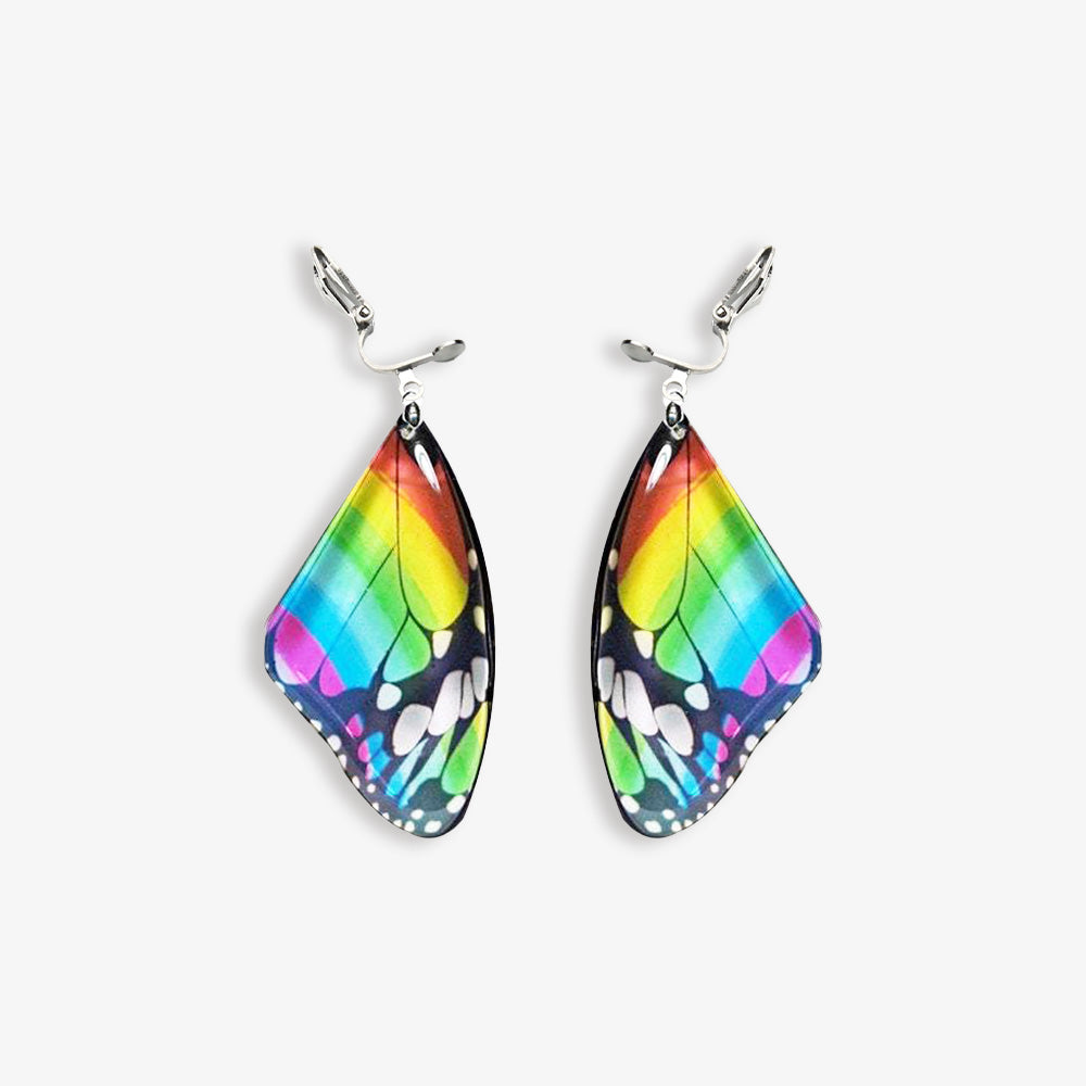 Monarch butterfly dangle clip on earrings in a colorful rainbow design, perfect for pride or summer wear.