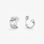 Front view of a pair of quilted silver huggie clip on earrings showing the textured diamond pattern.