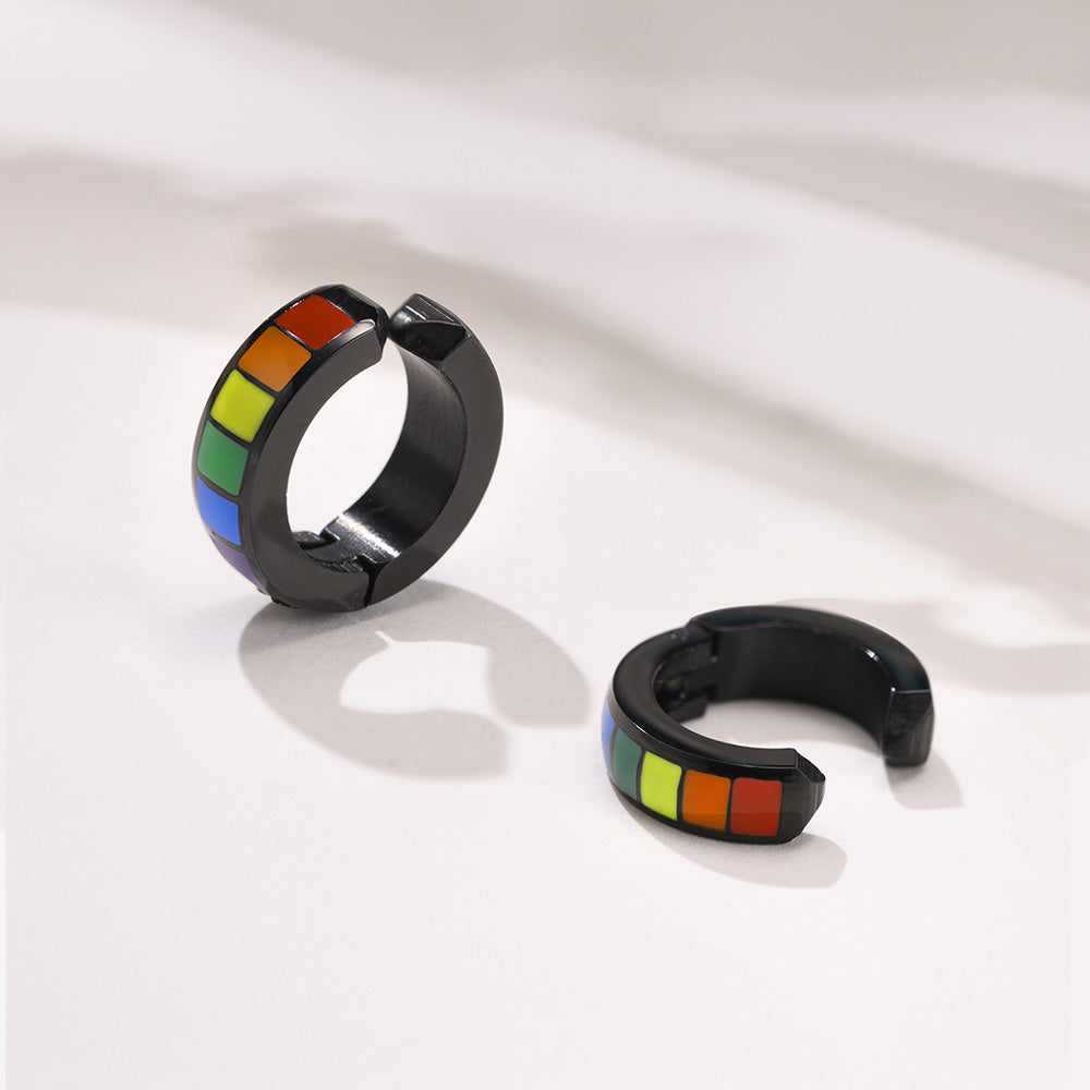 Black hoop earrings with a rainbow stripe design. A powerful piece of pride jewelry, ideal for showing support and celebrating bisexual identity.