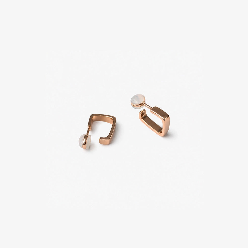 Rose gold square clip on hoop earrings showing the cushioned clip on closure