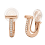 Close-up of rose gold T-motif huggie earrings featuring intricate micro pavé diamond settings on a clean background.