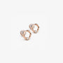 Pair of dainty rose gold twisted circle earrings with a small solitaire stone, perfect for luxury everyday wear.