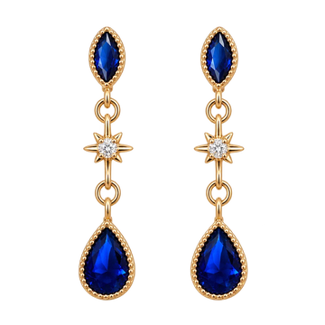 A pair of gold dangle earrings with marquise-cut blue gemstones, a star-shaped clear stone in the middle, and pear-shaped blue gemstones at the bottom