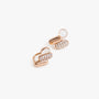 Rose gold earrings with clear zircons, designed as pill-shape