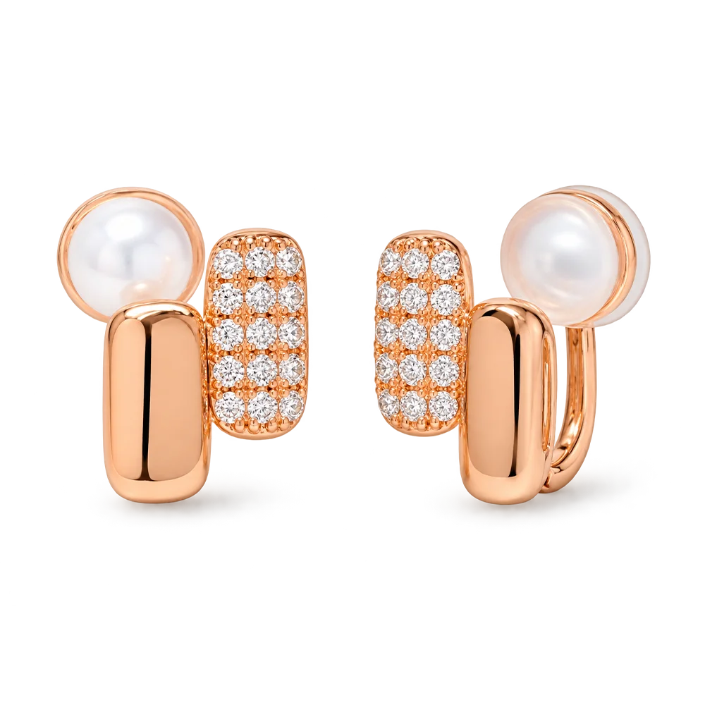 A pair of rose gold clip on huggie earrings featuring a polished rose gold bar, and a pavé-set rectangular cluster of clear stones, shown on a clean white background.