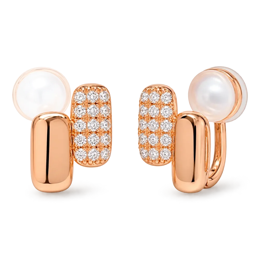 A pair of rose gold clip on huggie earrings featuring a polished rose gold bar, and a pavé-set rectangular cluster of clear stones, shown on a clean white background.