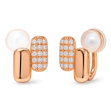 A pair of rose gold clip on huggie earrings featuring a polished rose gold bar, and a pavé-set rectangular cluster of clear stones, shown on a clean white background.