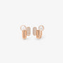 Front view of elongated pill-shaped rose gold huggie earrings with shining pavé cubic zirconia accents on a white background.