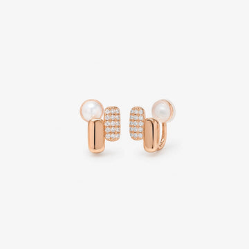 Front view of elongated pill-shaped rose gold huggie earrings with shining pavé cubic zirconia accents on a white background.