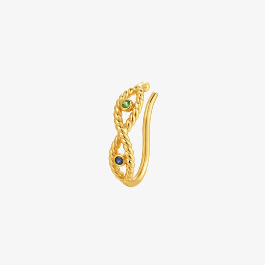 Serpentine twisted rope gold ear cuff with blue and green gemstones, shown on a white background to highlight its infinity shape.