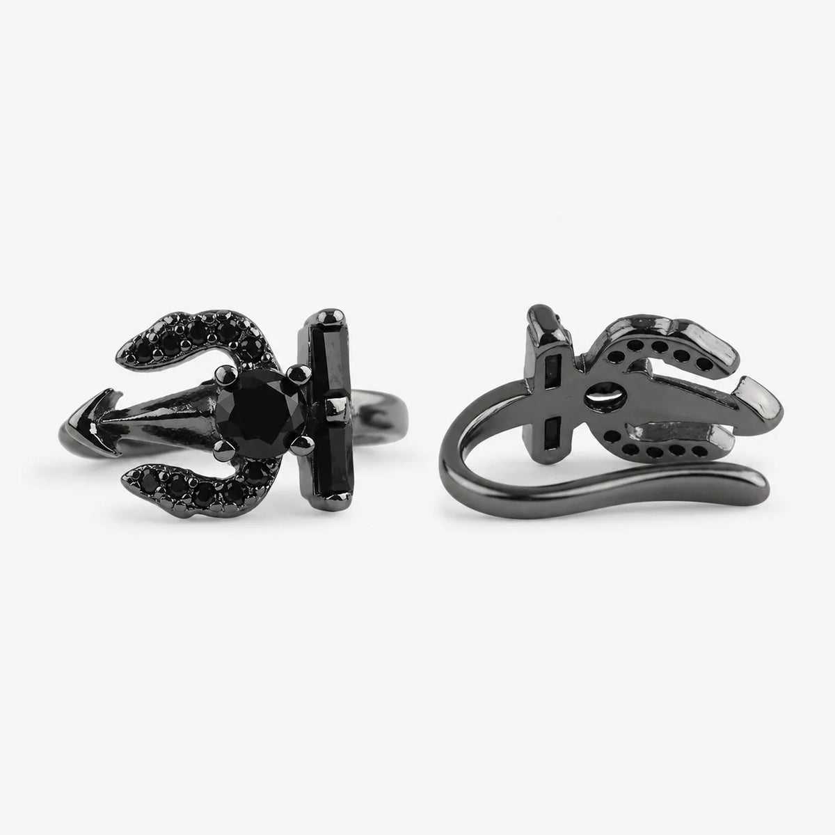 black hoop earrings featuring a stylized horseshoe design with a central faceted black gemstone and small black stones along the curved wings