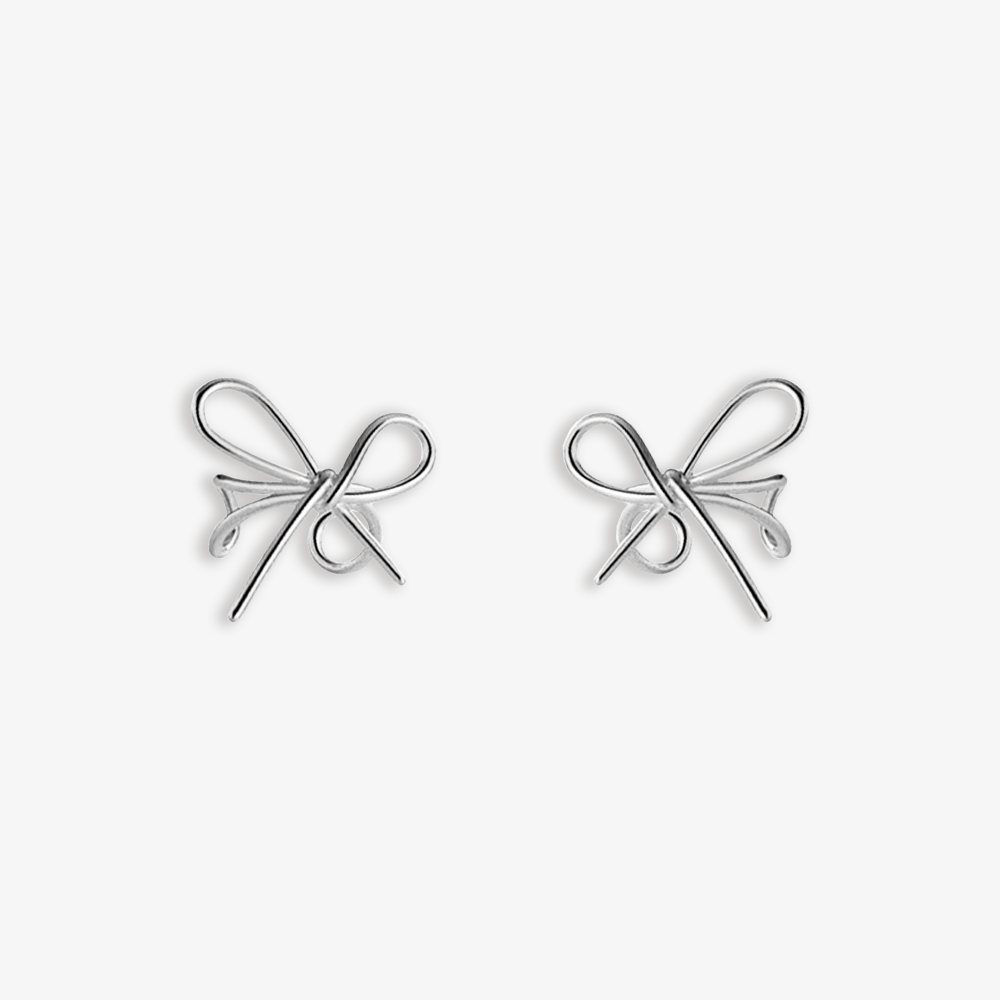 Sleek silver Chic Bow Conch Ear Cuffs made from S925 silver, embodying a minimalist and modern charm. Ideal for versatile styling, they provide an effortlessly chic addition to any look, suitable for both casual and formal events.