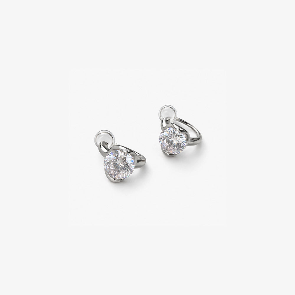 Angled view of silver cubic zirconia clip on stud earrings for non pierced ears