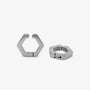 A pair of silver-toned geometric hoop earrings with a hexagonal open design, displayed on a clean light gray background.