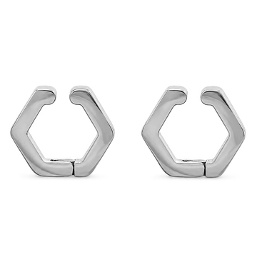 A pair of silver-toned geometric huggie hoop earrings with a hexagonal design, shown on a plain white background.