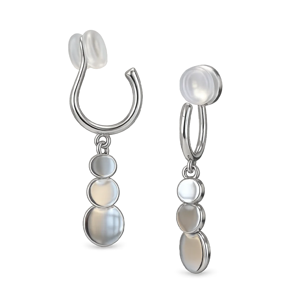 A pair of silver-toned dangle earrings with smooth, iridescent white shell-like disc elements, shown on a clean white background.