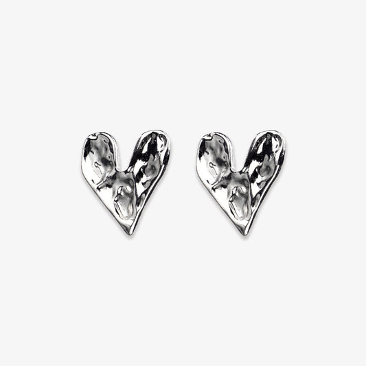 Sleek silver alloy heart clip-on earrings, showcasing a blend of traditional elegance and contemporary design. With a hinged-back clip-on mechanism, they provide an easy-to-wear sparkle for those who prefer not to pierce their ears.