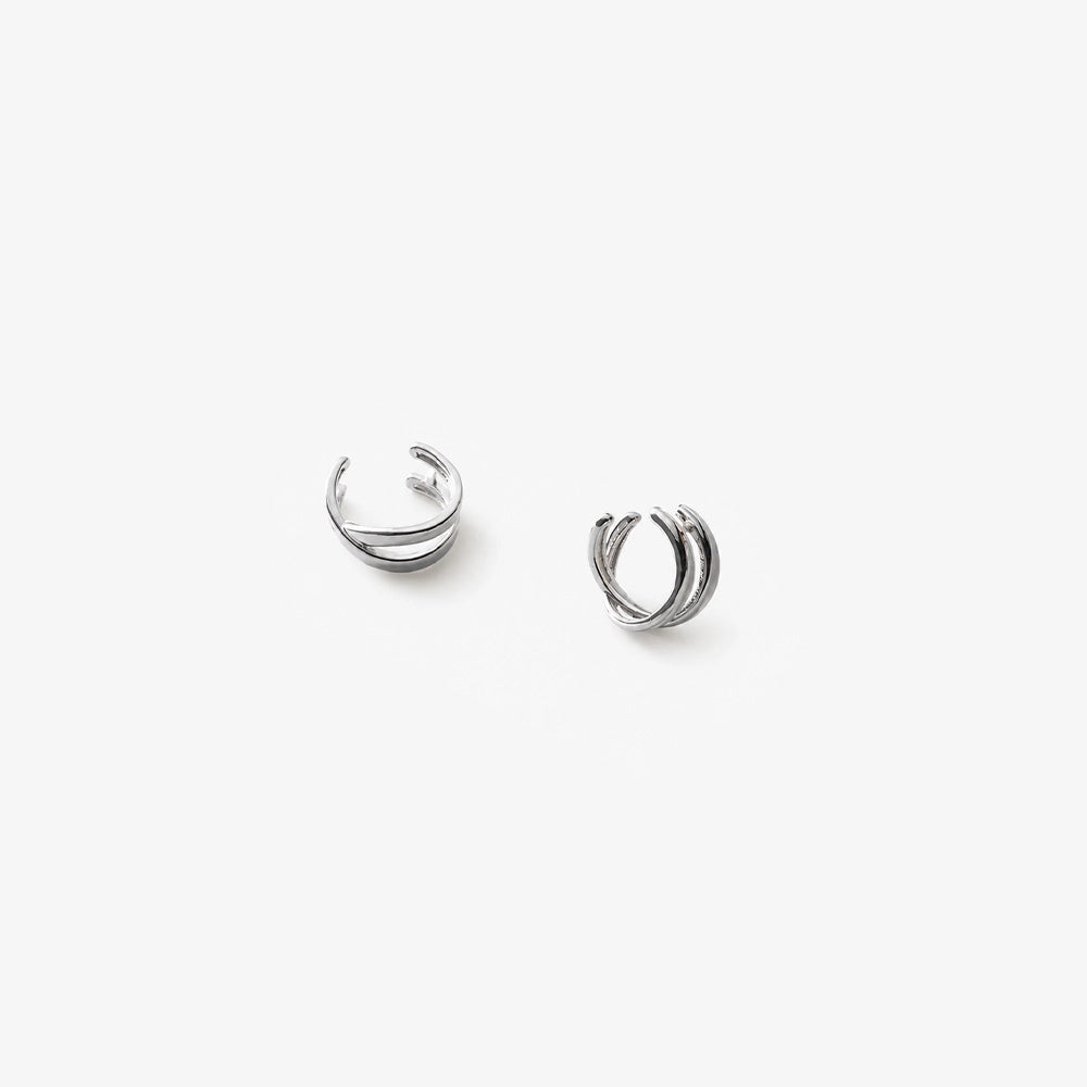 Helix Cross Ear Cuffs in sterling silver displayed on white background