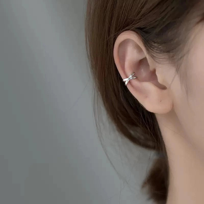Silver Helix cross ear cuff in sterling silver worn on ear, side profile 