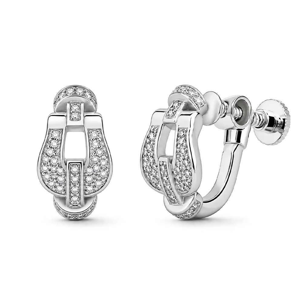 A pair of silver huggie hoop earrings adorned with pavé-set round diamonds, shown from both front and side angles on a clean white background.