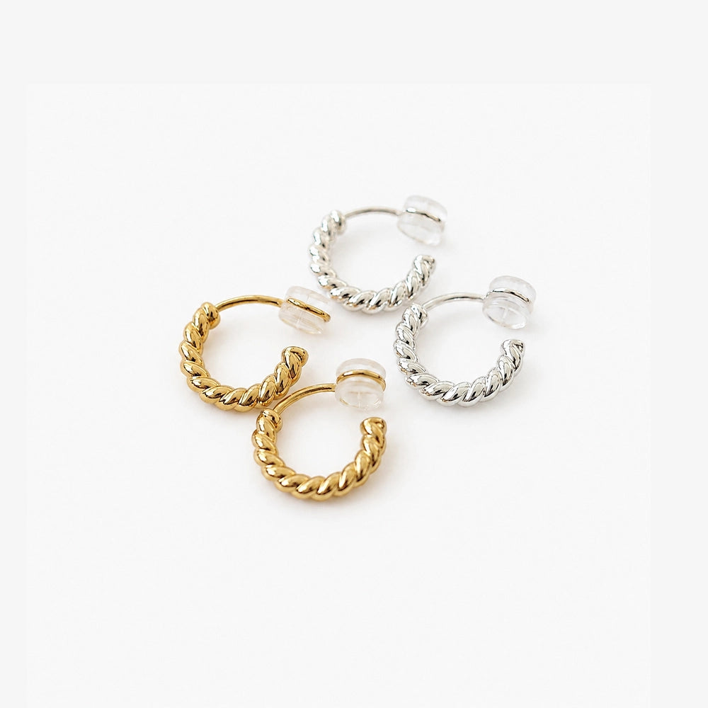 Twisted rope clip on hoop earrings shown in silver and gold finishes