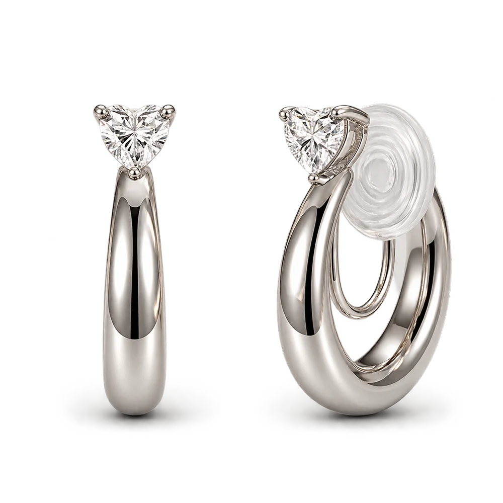 Small thick silver-tone hoop clip-on earrings topped with a heart-cut cubic zirconia, front and side views