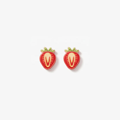 Pair of realistic 3D strawberry slice magnetic clip-on earrings with vibrant red and white resin detailing on a soft background.