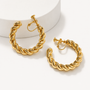 Twist Hoop Clip-On Earrings in Gold displayed on white stand, spiral rope texture detail