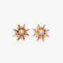 Reach for the sun with these elegant gold sunburst clip-on earrings.  Featuring delicate faux pearls, they add a touch of celestial flair to any outfit.  The hinged back clip-on closure ensures a secure and comfortable fit for non-pierced ears. 