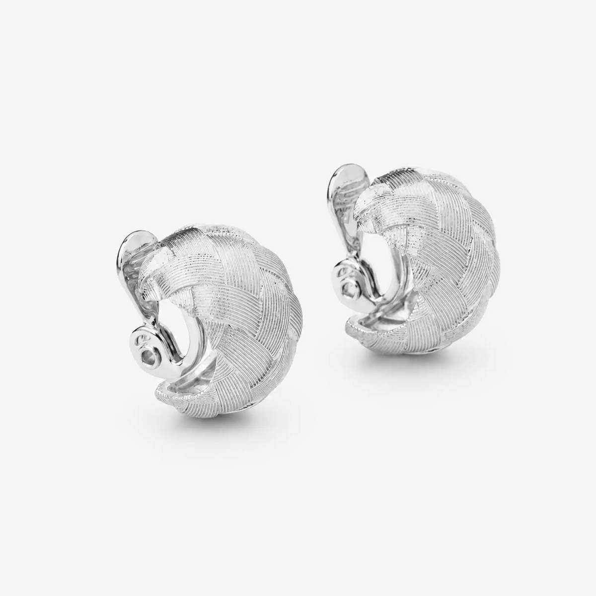 Woven silver-tone dome hoop clip-on earrings showing the adjustable hinged clip