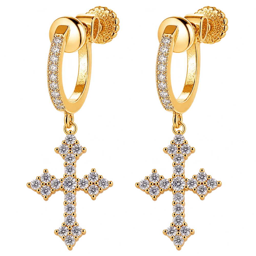 A pair of gold hoop earrings with small clear stones along the front and a dangling cross-shaped cross adorned with clear stones, shown on a plain white background.