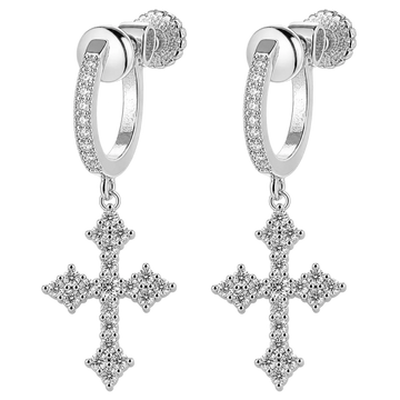 A pair of silver hoop earrings with small clear stones along the front and a dangling cross-shaped cross adorned with clear stones, shown on a plain white background.