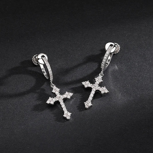 Showcase of Zirconia Cross Clip On Earrings with zirconia stones.